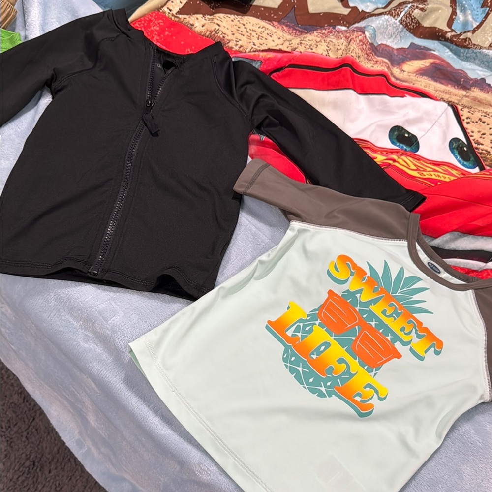Black Zip-Up Jacket and Graphic Tee